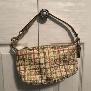 NEVER USED SMALL COACH PURSE